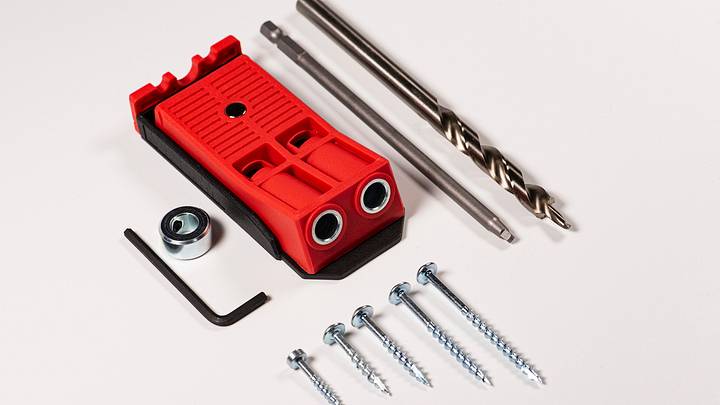 Red Pocket hole jig, dowel jig on white background