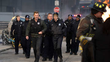 CHICAGO FIRE -- "In The Trenches: Part I" Episode 13011 -- Pictured: (l-r) Patrick John Flueger as Officer Adam Ruzek, Amy Morton as Desk Sgt. Trudy Platt -- (Photo by: Peter Gordon/NBC)