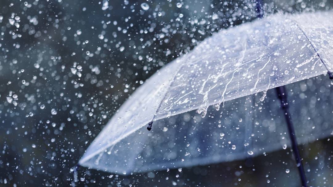 Umbrella in the heavy rain Umbrella in the heavy rain