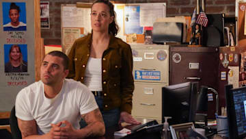 CHICAGO P.D. -- "Off Switch" Episode 12003 -- Pictured: (l-r) Benjamin Levy Aguilar as Dante Torres, Marina Squerciati as Officer Kim Burgess -- (Photo by: Elizabeth Sisson/NBC)