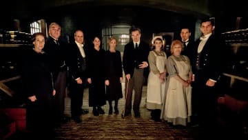 NBC'S RETURN TO DOWNTON ABBEY: A GRAND EVENT -- "Downton Abbey" -- Pictured: (l-r) Phyllis Logan as Mrs. Hughes, Jim Carter as Mr. Carson, Kevin Doyle as Mr. Molesley, Raquel Cassidy as Miss Baxter, Joanne Froggatt as Anna Bates, Brendan Coyle as Mr. Bates, Sophie McShera as Daisy, Lesley Nicol as Mrs. Patmore, Robert James-Collier as Thomas Barrow and Michael C. Fox as Andy -- (Photo by: Jaap Buitendijk/Focus Features)