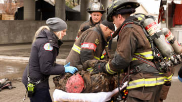 CHICAGO FIRE -- "Barely Gone" Episode 12001 -- Pictured: (l-r) Kara Killmer as Sylvie Brett, Taylor Kinney as Kelly Severide -- (Photo by: Adrian S Burrows Sr/NBC)