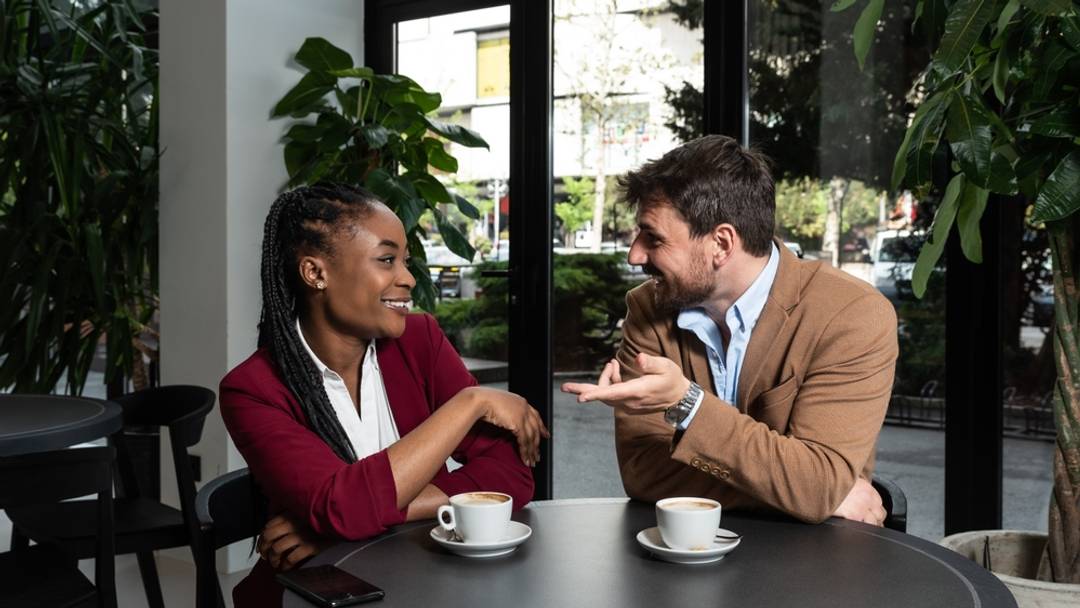 Man and a woman having coffee