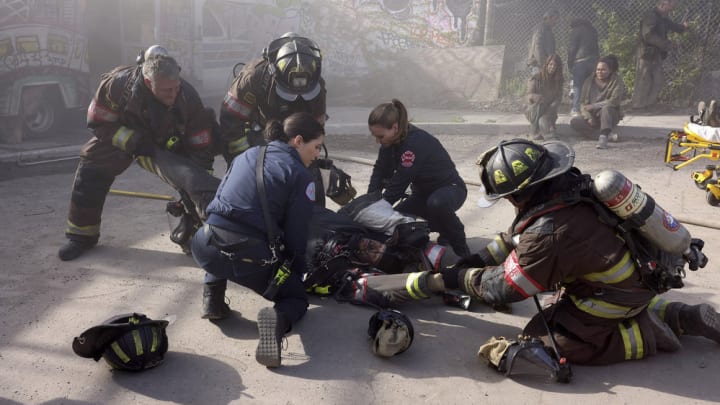 CHICAGO FIRE -- "Under Pressure" Episode 12012 -- Pictured: (l-r) Taylor Kinney as Kelly Severide, Hanako Greensmith as Violet Mikami, Jocelyn Hudon as Novak, Joe Minoso as Joe Cruz -- (Photo by: Adrian S Burrows Sr/NBC)