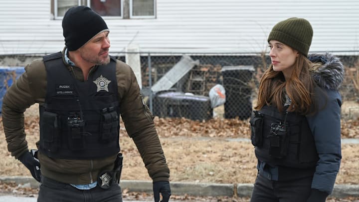 CHICAGO P.D. -- "Demons" Episode 12018 -- Pictured: (l-r) Patrick John Flueger as Officer Adam Ruzek, Marina Squerciati as Officer Kim Burgess -- (Photo by: Lori Allen/NBC)