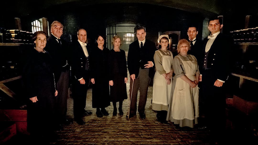 NBC'S RETURN TO DOWNTON ABBEY: A GRAND EVENT -- "Downton Abbey" -- Pictured: (l-r) Phyllis Logan as Mrs. Hughes, Jim Carter as Mr. Carson, Kevin Doyle as Mr. Molesley, Raquel Cassidy as Miss Baxter, Joanne Froggatt as Anna Bates, Brendan Coyle as Mr. Bates, Sophie McShera as Daisy, Lesley Nicol as Mrs. Patmore, Robert James-Collier as Thomas Barrow and Michael C. Fox as Andy -- (Photo by: Jaap Buitendijk/Focus Features)