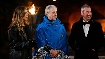 THE TRAITORS -- "The Day of Reckoning is Upon Us" Episode 311 -- Pictured: (l-r) Gabby Windey, Alan Cumming, Lord Ivar Mountbatten -- (Photo by: Euan Cherry/Peacock)