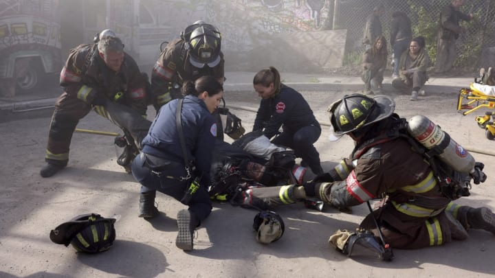 CHICAGO FIRE -- "Under Pressure" Episode 12012 -- Pictured: (l-r) Taylor Kinney as Kelly Severide, Hanako Greensmith as Violet Mikami, Jocelyn Hudon as Novak, Joe Minoso as Joe Cruz -- (Photo by: Adrian S Burrows Sr/NBC)