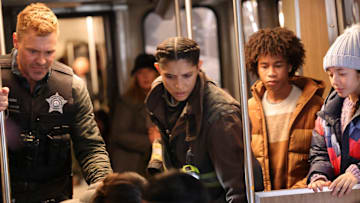 CHICAGO MED -- "In The Trenches: Part II" Episode 1011 -- Pictured: (l-r) Patrick John Flueger as Officer Adam Ruzek, Miranda Rae Mayo as Stella Kidd -- (Photo by: George Burns Jr/NBC)
