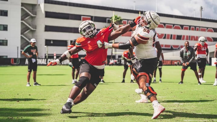 Rueben Bain Jr (4) battling against Luis Cristobal Jr. (52) during call camp