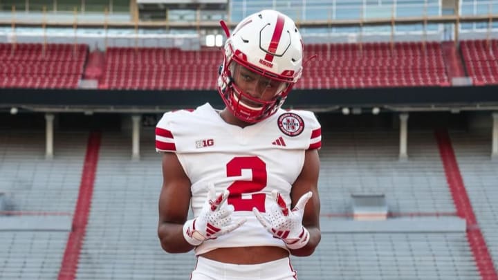 Four-star wide receiver Isaiah Mozee wearing a Nebraska uniform on a visit to Lincoln. He has officially flipped his commitment from Oregon to Nebraska.