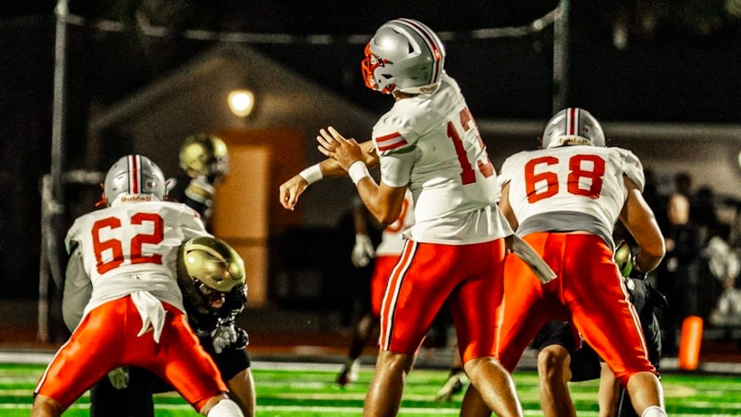 Lake Mary senior quarterback Noah Grubbs, shown here in a game against Bishop Moore, led Lake Mary to the Class 7A state championship. The Notre Dame signee threw a Hail Mary pass on the game's final play to help the Rams stun Vero Beach, 28-27.