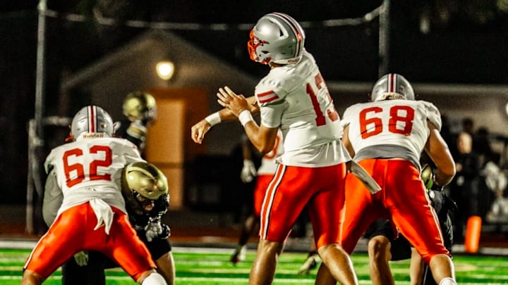 Lake Mary senior quarterback Noah Grubbs, shown here in a game against Bishop Moore, led Lake Mary to the Class 7A state championship. The Notre Dame signee threw a Hail Mary pass on the game's final play to help the Rams stun Vero Beach, 28-27.