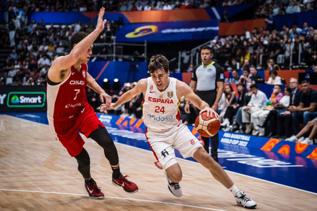 San Antonio Spurs point guard Juan Nuñez attacks inside during a game playing for Spain. 