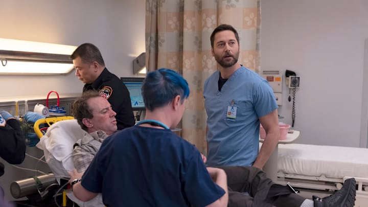 NEW AMSTERDAM -- "Falling" Episode 511 -- Pictured: Rob McClure as Dave August, Ryan Eggold as Dr. Max Goodwin -- (Photo by: 