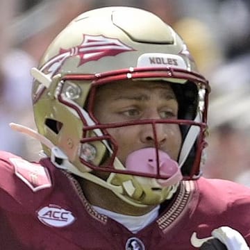 Sep 6, 2025; Tallahassee, Florida, USA; Florida State Seminoles wide receiver Duce Robinson (0) catches a touchdown during the first half against the East Texas A&M at Doak S. Campbell Stadium. Mandatory Credit: Melina Myers-Imagn Images