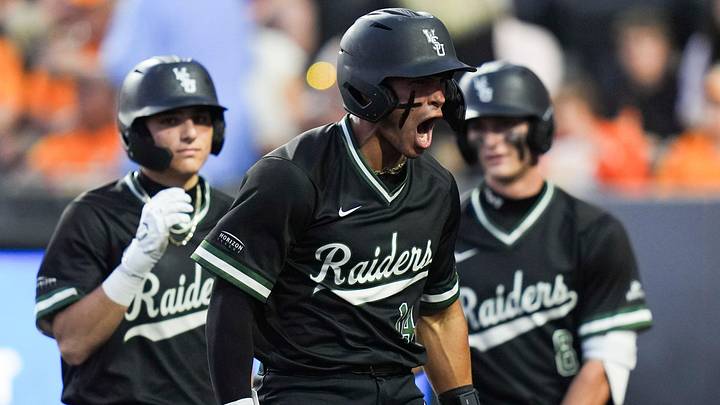 Wright State’s Andrew Duncan (14) celebrates running home safely during a baseball game between Tennessee and Wright State in Lindsey Nelson Stadium in Knoxville, Tennessee, March 6, 2026.