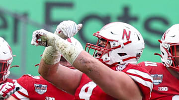 Nebraska Cornhuskers defensive lineman Ty Robinson (9) celebrates a defensive stop during the first half against the Boston College Eagles