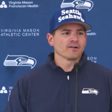 Seattle Seahawks coach Mike Macdonald speaks with reporters following the team's second open OTA practice.