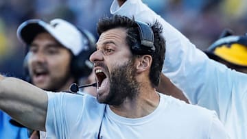Michigan linebacker coach George Helow reacts to a play against Rutgers during the second half at Michigan Stadium in Ann Arbor on Saturday, Sept. 25, 2021.