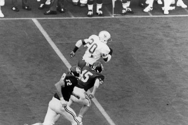 Nebraska's Johnny Rodgers races downfield during his 72-yard punt return for the opening score in the Game of the Century aga