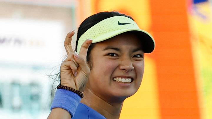 Alexandra Eala gestures to her player's box
