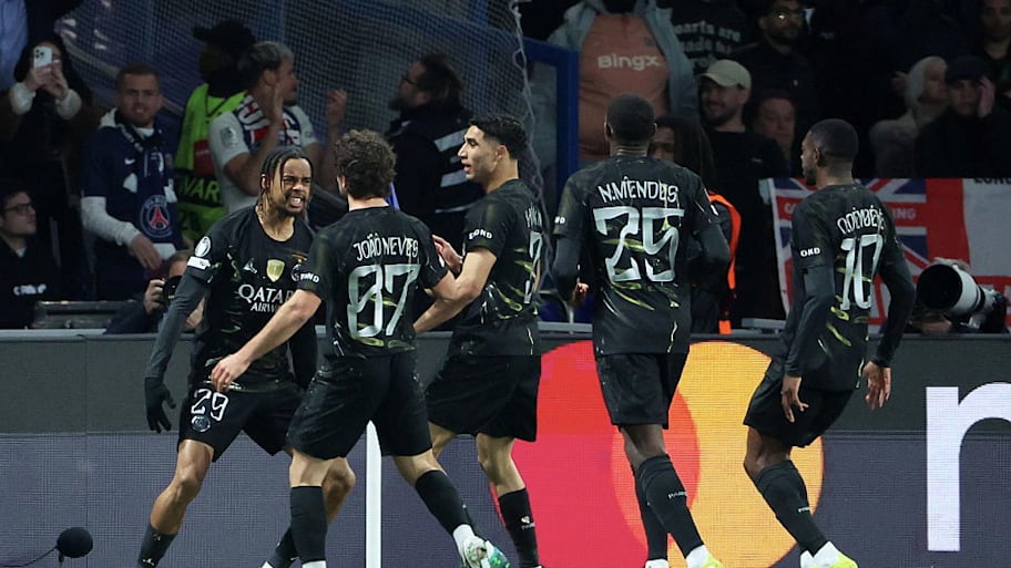PSG players celebrate a goal vs. Chelsea