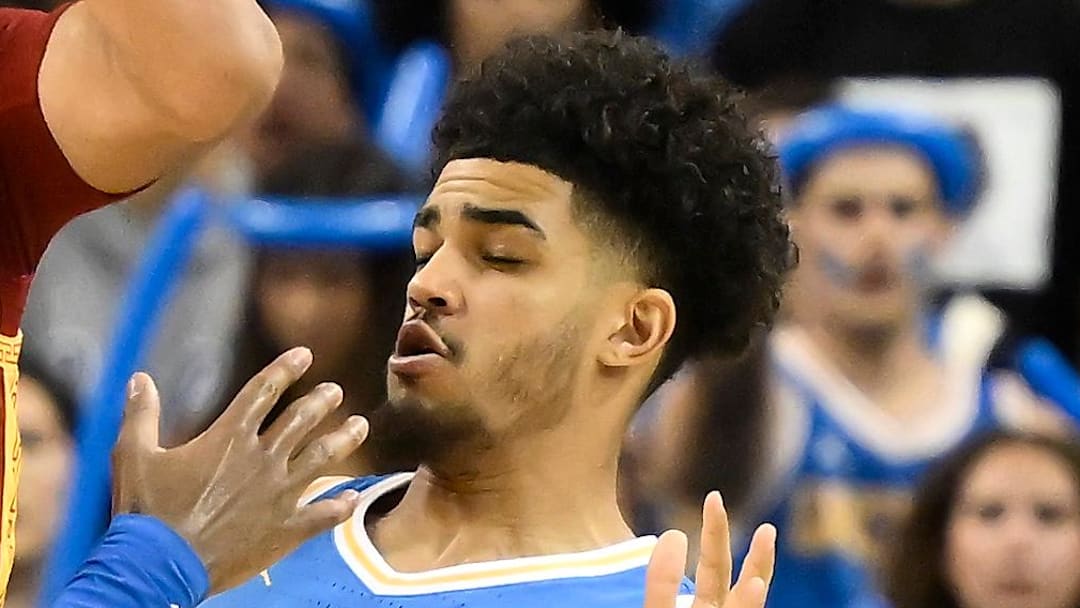 Feb 24, 2026; Los Angeles, California, USA; Southern California Trojans forward Jacob Cofie (6) tries to pass the ball while defended by UCLA Bruins guards Eric Dailey Jr. (3) and Eric Freeny (8) during the 2nd half at Pauley Pavilion presented by Wescom Financial. Mandatory Credit: Robert Hanashiro-Imagn Images