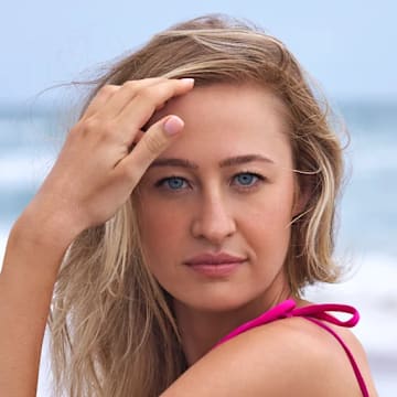 Nelly Korda was photographed by Ben Horton at The Boca Raton. Swimsuit by Agua Bendita.