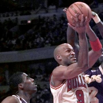 December 17, 1996; Chicago, IL; Chicago's Ron Harper(9), middle, goes for the basket in the first half. At left is LA' s Kobe Bryant(8) and at right is LA's Jerome Kersey (12). Mandatory Credit: Annie Ryan/USA TODAY-USA TODAY NETWORK 