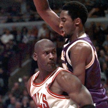 December 17, 1997; Chicago, IL;Chicago's Michael Jordan  (23), bottom, is guarded by LA's Kobe Bryant (8) in the second half. Mandatory Credit: Anne Ryan-USA TODAY NETWORK 
