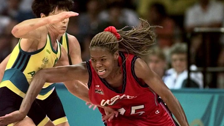 Aug 2, 1996; Atlanta, GA, USA; USA's Nikki McCray drives past Australia's Sandy Brondello (6) Friday during Olympic basketball play in Atlanta. Mandatory Credit: Robert Hanashiro-USA TODAY NETWORK