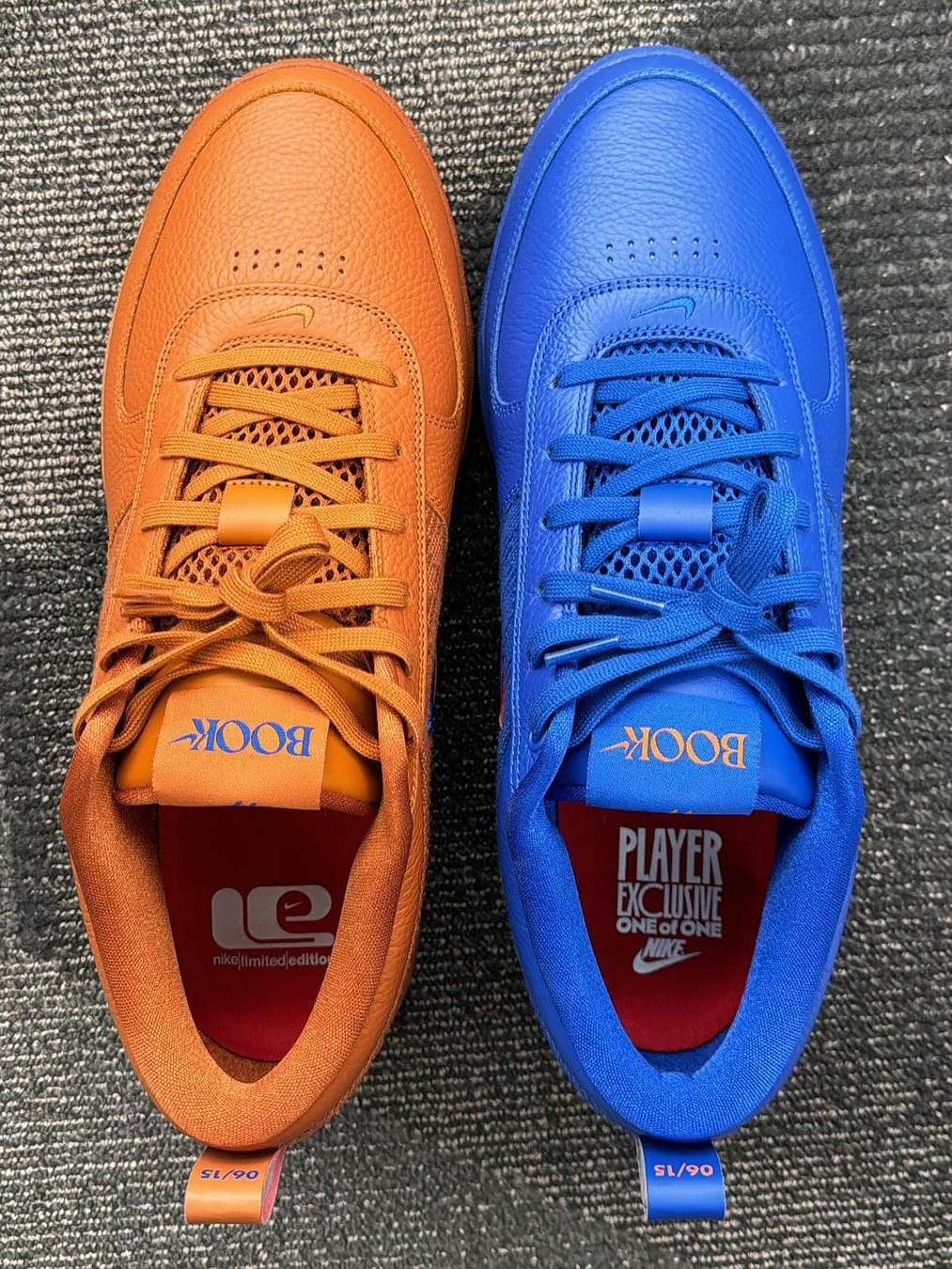 The insoles of P.J. Tucker's orange and blue Nike sneakers.