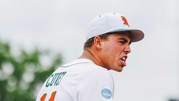 Miami Hurricanes third baseman Daniel Cuvet (14) after winning in the Louisville Super Regionals.