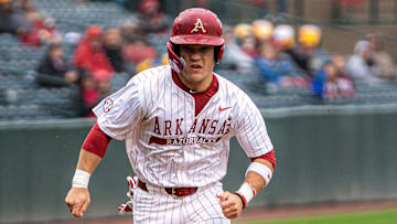 Cam Kozeal runs the bases in the series opener against Mizzou. The Razorbacks won 21-3