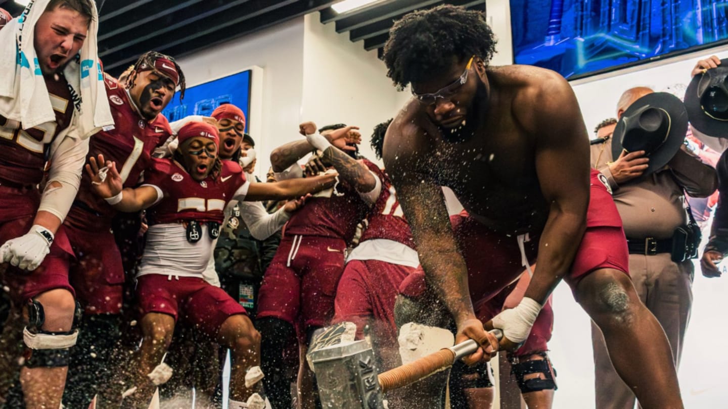 FSU football celebrates by breaking the rock after Virginia Tech rout