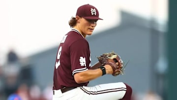 Mississippi State Bulldogs pitcher Pico Kohn winds up to deliver a pitch against the Florida Gators at Dudy Noble Field in Starkville, Miss.