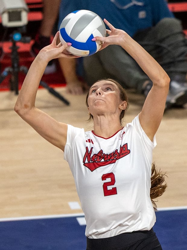 Nebraska setter Bergen Reilly prepares the ball for a teammate.
