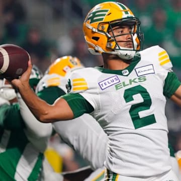 Edmonton Elks quarterback Tre Ford (2) throws against Saskatchewan Roughriders during the first half of CFL football action in Regina, on Friday, September 15, 2023. (Heywood Yu/CP)