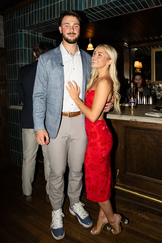 Olivia Dunne and Paul Skenes poses side by side in Baton Rouge..