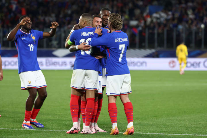 Jonathan Clauss, Kylian Mbappe, Antoine Griezmann