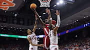 Alabama center Clifford Omoruyi (11) shoots a layup against Auburn at Neville Arena in Auburn, AL on Saturday, Mar 8, 2025.