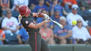 Alabama Softball Player Abby Duchscherer (10) hits the ball at Katie Seashole Pressly Softball Stadium in Gainesville, FL on Friday, Apr 18, 2025.