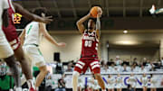 Alabama guard Houston Mallette (95) looks to pass the ball against North Dakota at Betty Engelstad Sioux Center in Grand Forks, ND on Wednesday, Dec 18, 2024.
