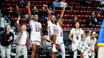 Mississippi State Center Rocío Jiménez (#13) and Mississippi State Forward Favour Nwaedozi (#25) during the ACC/SEC Challenge game between the Pittsburgh Panthers and the Mississippi State Bulldogs at Humphrey Coliseum in Starkville, MS.