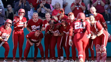 Alabama Softball Player Kali Heivilin (22) celebrates a homerun with her teammates against Oklahoma at Rhoads Stadium in Tuscaloosa, AL on Sunday, Apr 13, 2025.