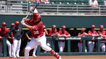 Alabama third baseman Jason Torres (32).
