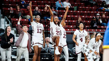 Mississippi State Center Rocío Jiménez (#13) and Mississippi State Forward Favour Nwaedozi (#25) during the ACC/SEC Challenge game between the Pittsburgh Panthers and the Mississippi State Bulldogs at Humphrey Coliseum in Starkville, MS.