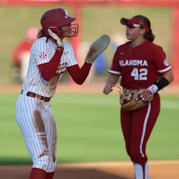Alabama Softball Player Audrey Vandagriff (12) celebrates after play during the game against Oklahoma at Rhoads Stadium in Tuscaloosa, AL on Monday, Apr 14, 2025.