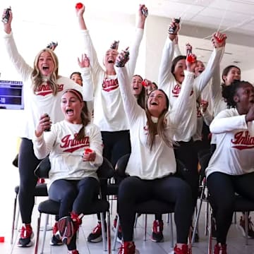 Indiana's softball team celebrates as their name was called during the NCAA Tournament selection show on Sunday. Indiana is headed to the Fayetteville Regional at Arkansas.